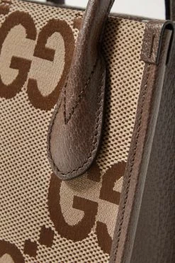 GUCCI Jumbo GG Mini Tote Aus Canvas Mit Jacquard-Muster Mit Lederbesätzen ,Camel -Offizielle GUCCI Website w920 q60 134