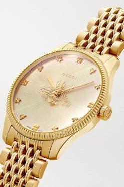 GUCCI G-Timeless 29 Mm Uhr Mit Goldfarbener PVD-Beschichtung 10 GUCCI G-Timeless 29 Mm Uhr Mit Goldfarbener PVD-Beschichtung -Offizielle GUCCI Website w920 q60 1386