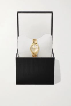 GUCCI G-Timeless 29 Mm Uhr Mit Goldfarbener PVD-Beschichtung 15 GUCCI G-Timeless 29 Mm Uhr Mit Goldfarbener PVD-Beschichtung -Offizielle GUCCI Website w920 q60 1391