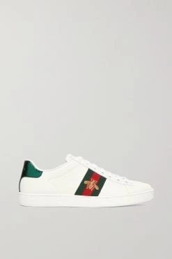 Offizielle GUCCI Website 26 GUCCI Ace Sneakers Mit Besatz Aus Wasserschlangenleder Und Stickerei ,Weiß
