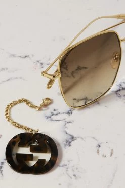 GUCCI EYEWEAR Goldfarbene Oversized-Sonnenbrille Mit Eckigem Rahmen Und Verzierungen -Offizielle GUCCI Website w920 q60 2729